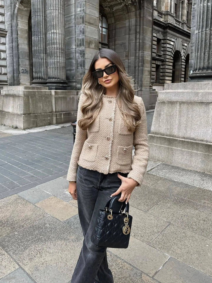 Elegant damesvest met knoopsluiting en zakken – Nilda