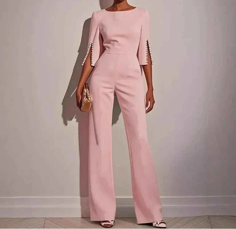 Elegante jumpsuit met pareldetails - Céline