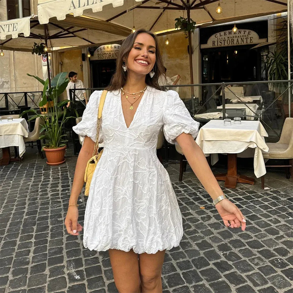 Elegante witte broderie jurk met pofmouwen – Lydia