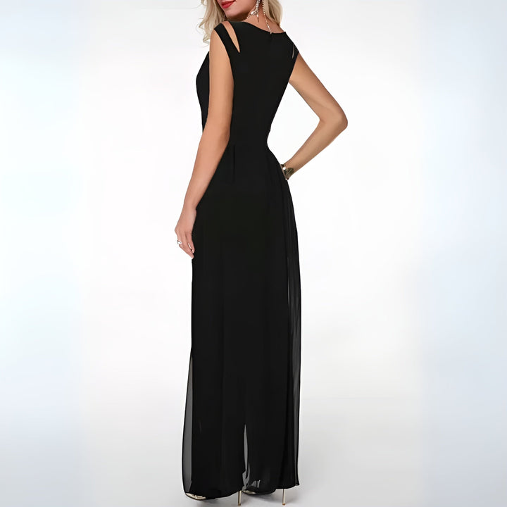 Mouwloze elegante jumpsuit met wijde pijpen en flowy overlay