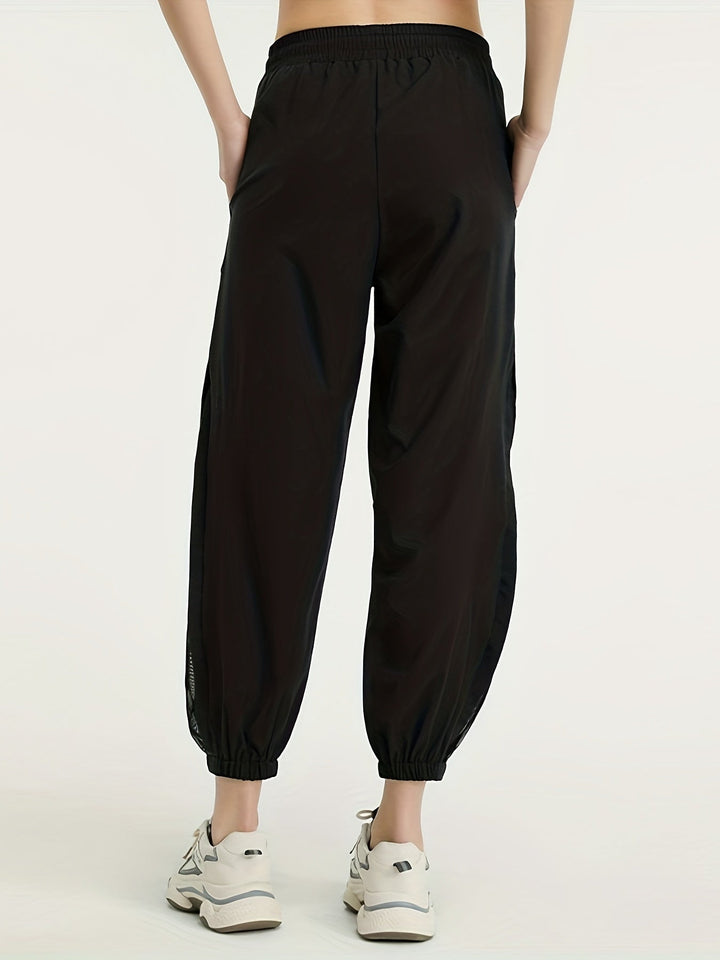 Sportieve dames jogger met mesh details – Evoque